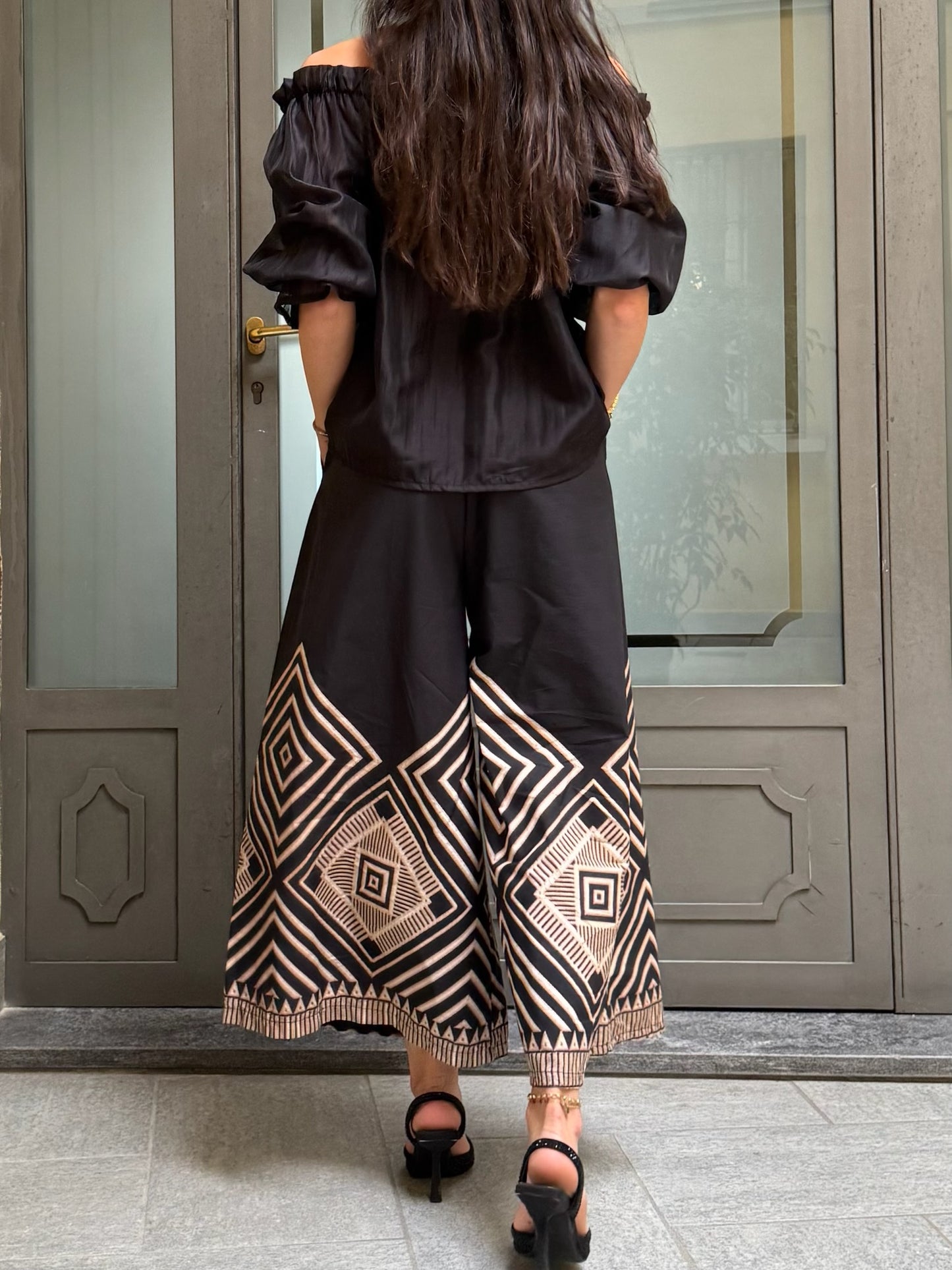 Pantalone disegno geometrico